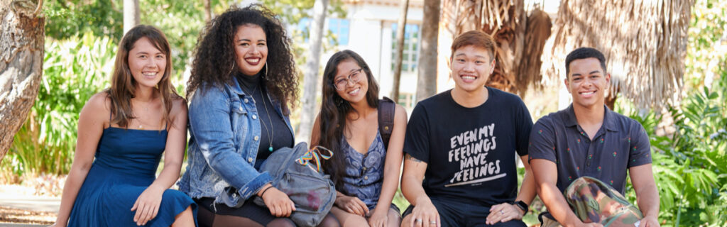 students sitting outside